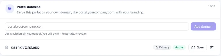 The Domains tab showing a portal domain marked Primary and Active, with Open and remove buttons