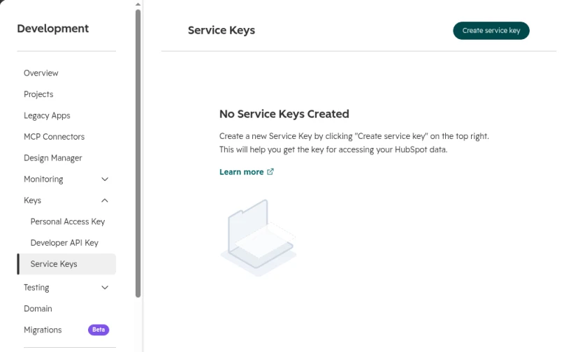 HubSpot's Service Keys page in the Development menu, with a Create service key button