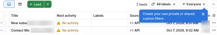 The Pipedrive Leads inbox with a New subscriber lead and a Contact Me lead, both with API as the source
